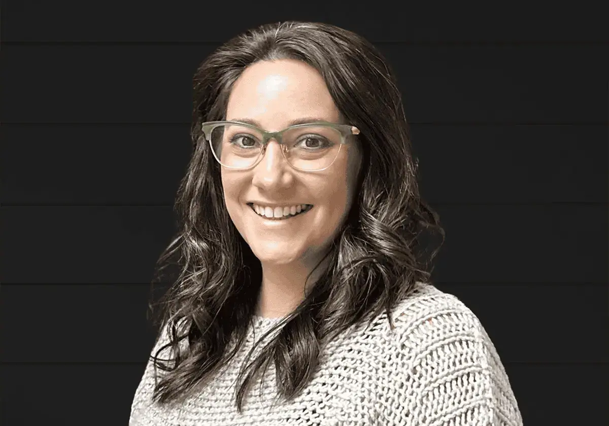 a woman wearing glasses and a sweater - Dana-rejuvenate olympia